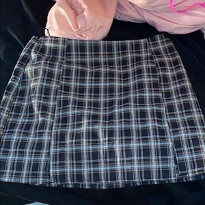 Green white and black skirt
